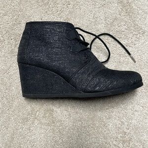 Toms wedge black boots 10 worn less than 5 times.  Fit more like 9 run small.